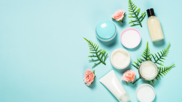 Cosmetics packaging with blue background IFRA PR on E Co Beauty Score Consortium 22022022